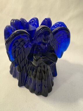 Three cobalt blue angels votive holder